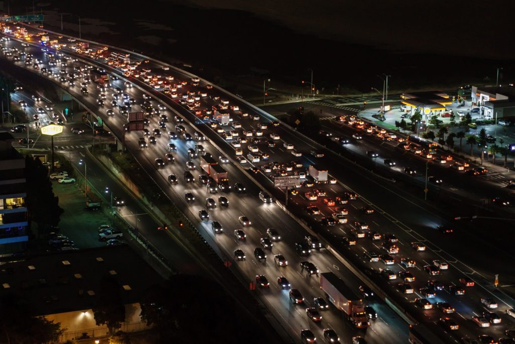 Traffic jam on a highway in the dark, avoiding this is one huge benefit of working from home
