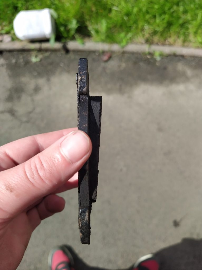 rear brake pad in terrible condition