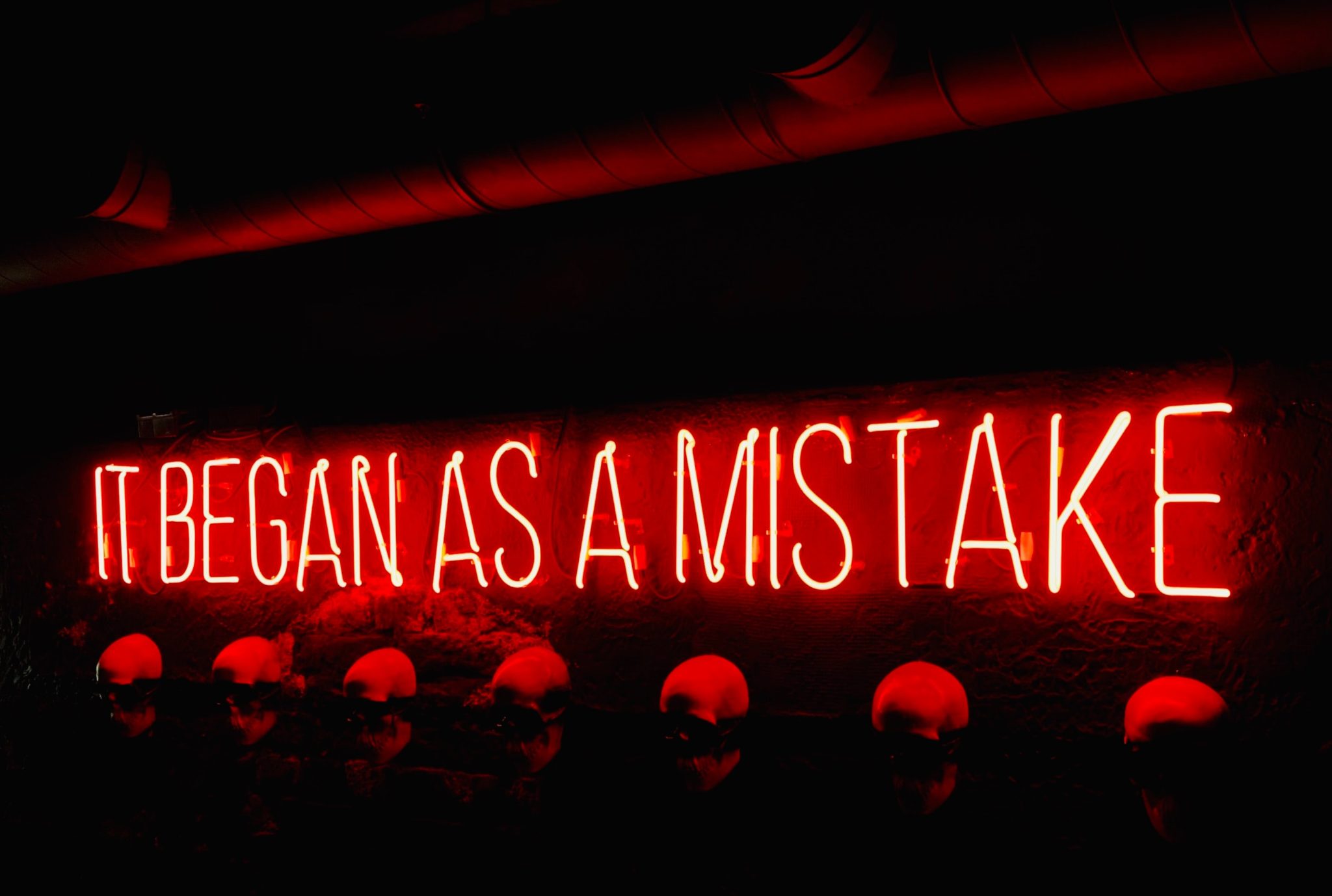 it began as a mistake neon sign